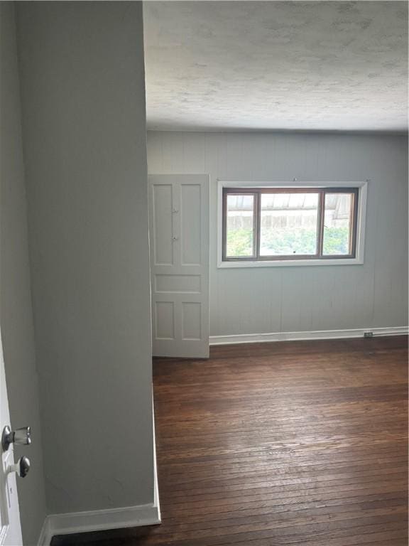 965 Leeds, Monessen, PA 15062 - empty room with dark wood-type flooring and baseboards