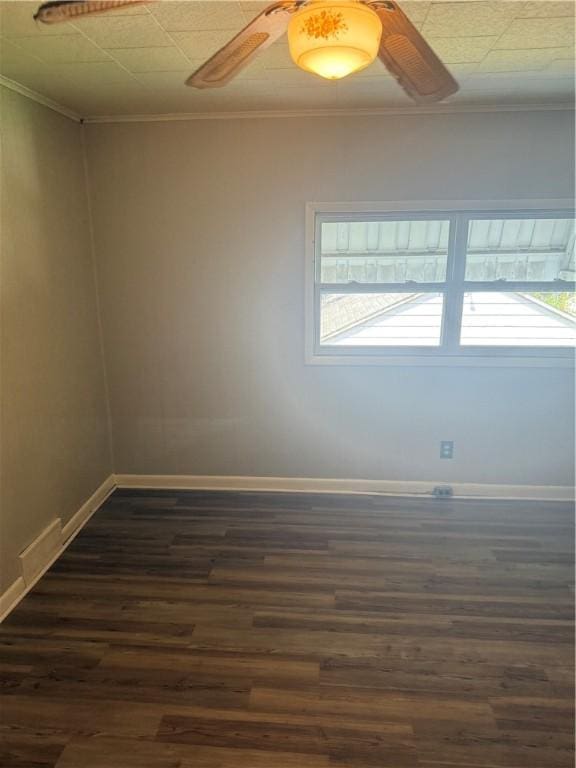 965 Leeds, Monessen, PA 15062 - spare room featuring ornamental molding, a ceiling fan, and dark wood finished floors