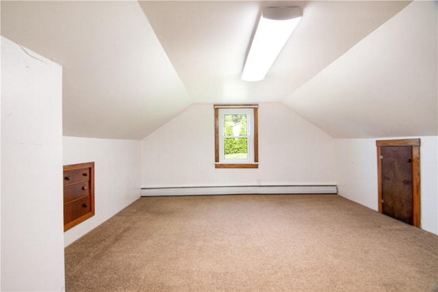 963 Herman Rd, Summit Twp, PA 16002 - additional living space featuring carpet floors, vaulted ceiling, and a baseboard heating unit