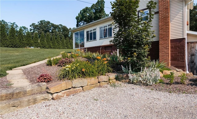 963 Herman Rd, Summit Twp, PA 16002 - view of home's exterior with a yard and a sunroom
