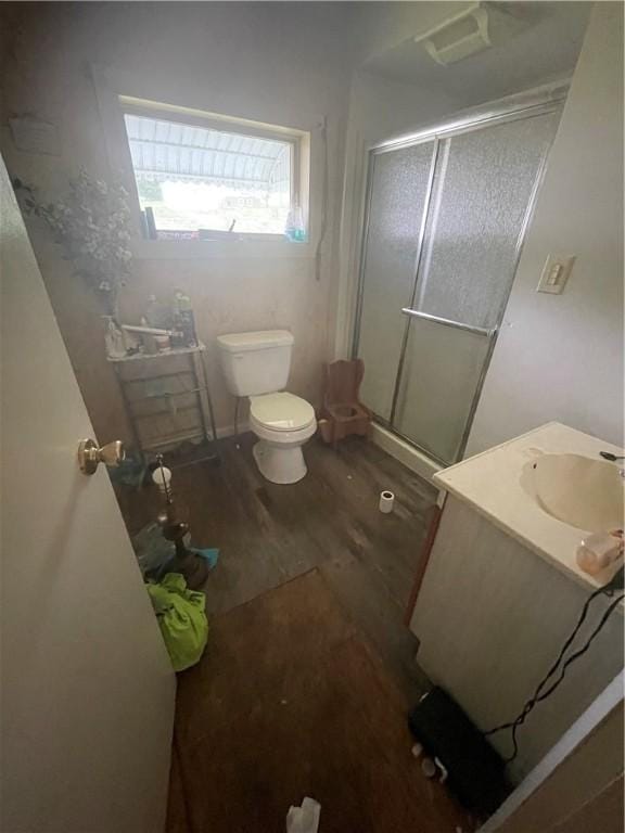 137 Front St, Derry Twp, PA 15717 - full bath featuring wood finished floors, vanity, and a stall shower