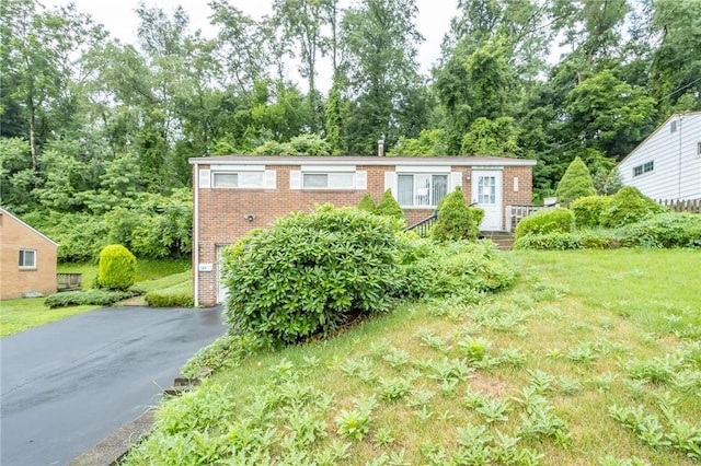 127 Mardi Gras Dr, Plum Boro, PA 15239 - ranch-style home featuring driveway and brick siding
