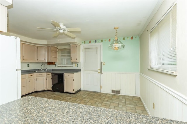 127 Mardi Gras Dr, Plum Boro, PA 15239 - kitchen featuring freestanding refrigerator, dark countertops, dishwasher, wainscoting, and a ceiling fan