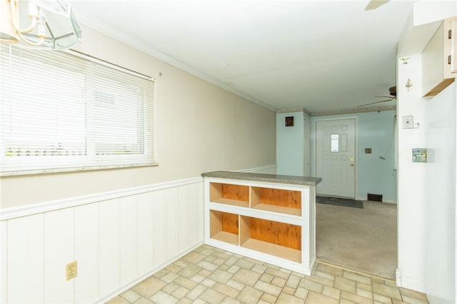 127 Mardi Gras Dr, Plum Boro, PA 15239 - spare room featuring healthy amount of natural light, a wainscoted wall, and crown molding