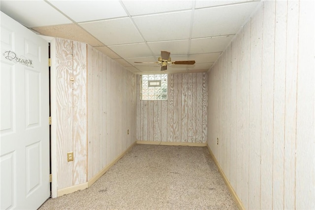 127 Mardi Gras Dr, Plum Boro, PA 15239 - basement with a drop ceiling, a ceiling fan, wood walls, and carpet