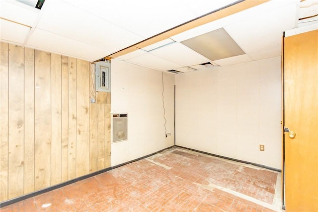 127 Mardi Gras Dr, Plum Boro, PA 15239 - finished basement featuring wooden walls, brick patterned flooring, and electric panel