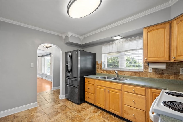 57 Welcome St, East Bethlehem, PA 15333 - kitchen with crown molding, white range with electric stovetop, tasteful backsplash, healthy amount of natural light, and refrigerator with ice dispenser