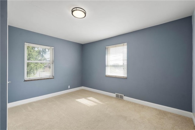 57 Welcome St, East Bethlehem, PA 15333 - carpeted empty room with plenty of natural light