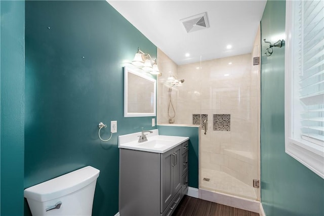 57 Welcome St, East Bethlehem, PA 15333 - full bathroom with a stall shower, vanity, and wood finished floors
