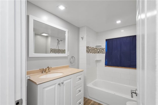 57 Welcome St, East Bethlehem, PA 15333 - full bathroom with vanity, washtub / shower combination, wood finished floors, and recessed lighting
