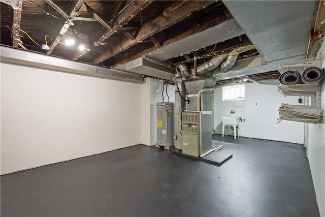 57 Welcome St, East Bethlehem, PA 15333 - below grade area with heating unit and electric water heater