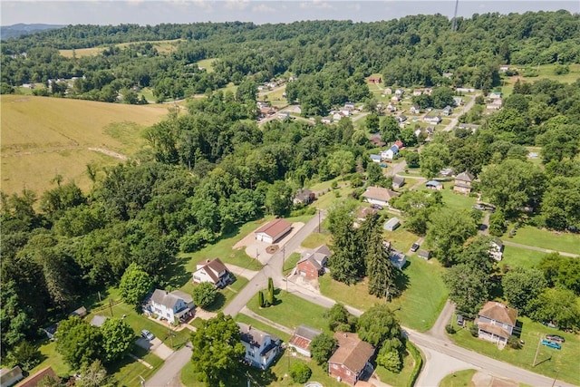 57 Welcome St, East Bethlehem, PA 15333 - aerial view of property and surrounding area featuring a heavily wooded area