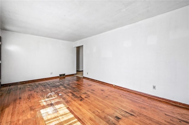 129 Shenango Park Rd, Pymatuning Twp, PA 16154 - empty room with hardwood / wood-style floors