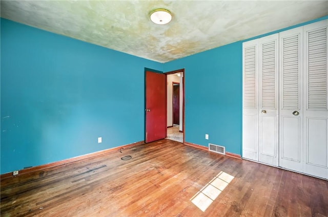 129 Shenango Park Rd, Pymatuning Twp, PA 16154 - unfurnished bedroom with hardwood / wood-style floors and a closet