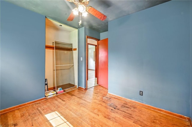 129 Shenango Park Rd, Pymatuning Twp, PA 16154 - unfurnished bedroom with wood finished floors, a closet, and a ceiling fan