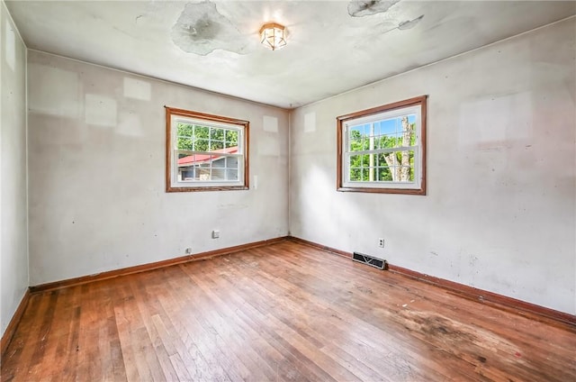 129 Shenango Park Rd, Pymatuning Twp, PA 16154 - unfurnished room featuring plenty of natural light and hardwood / wood-style flooring