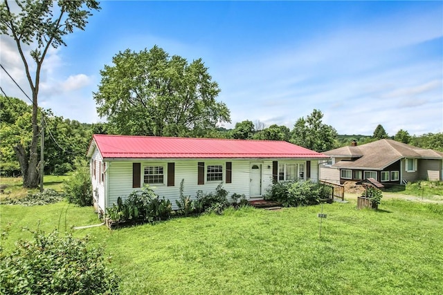 129 Shenango Park Rd, Pymatuning Twp, PA 16154 - ranch-style home featuring a front yard and a metal roof