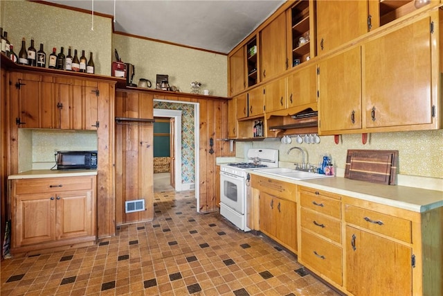 827 Beaver Rd, Ambridge, PA 15003 - kitchen with white range with gas cooktop, open shelves, light countertops, black microwave, and ornamental molding