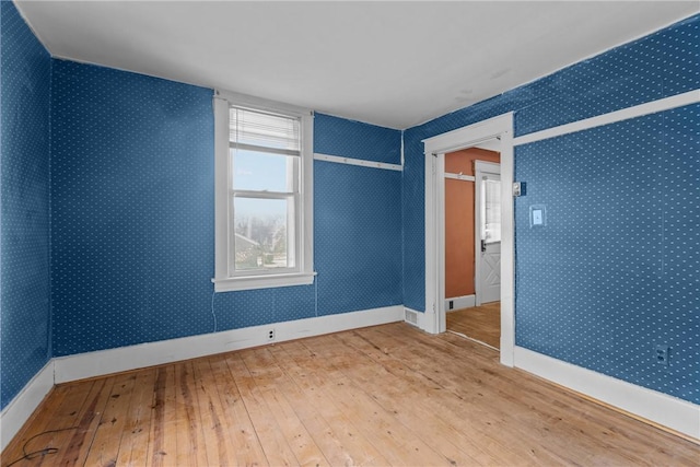 827 Beaver Rd, Ambridge, PA 15003 - empty room featuring hardwood / wood-style flooring and baseboards