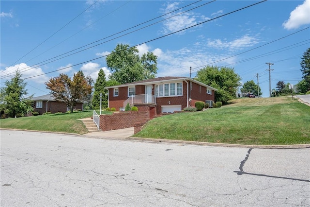 1936 Sylvan Ave, Latrobe, PA 15650 - ranch-style home featuring brick siding, a garage, a front yard, and driveway