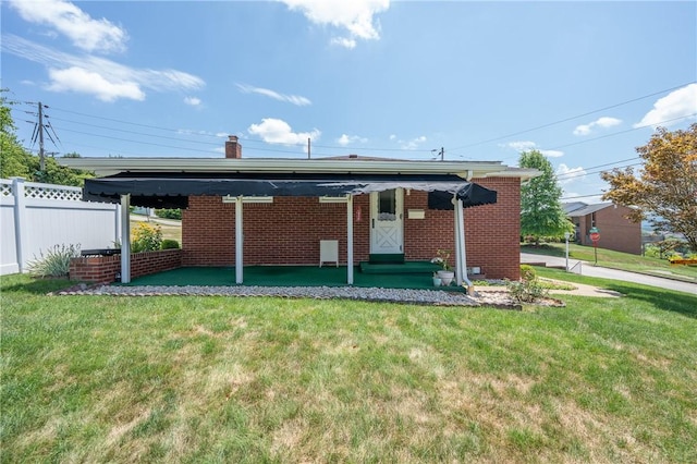 1936 Sylvan Ave, Latrobe, PA 15650 - rear view of house featuring a chimney and brick siding