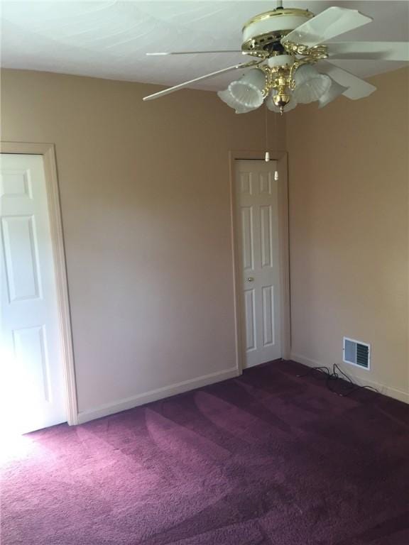 1216-1218 Clark St Unit 1216, White Oak, PA 15131 - empty room with dark carpet and ceiling fan