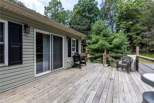 178 Christopher, Christopher, PA 16640 - wooden deck featuring area for grilling and view of wooded area