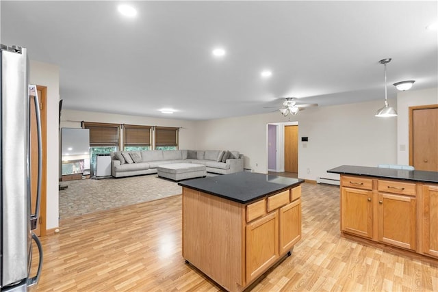178 Christopher, Christopher, PA 16640 - kitchen featuring dark countertops, freestanding refrigerator, light wood-style floors, and recessed lighting