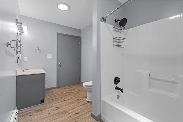 178 Christopher, Christopher, PA 16640 - full bathroom featuring vanity, wood finished floors, a baseboard radiator, and tub / shower combination