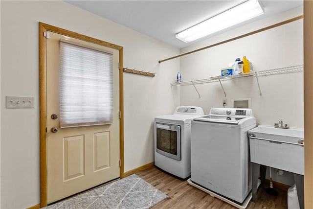 178 Christopher, Christopher, PA 16640 - laundry area with washer and dryer and light wood-style flooring