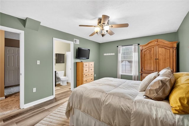 847 Sunset Cir, Cranberry Twp, PA 16066 - bedroom featuring light wood-style flooring, connected bathroom, and a ceiling fan