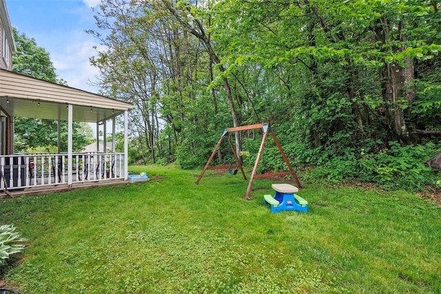 215 E Edgewood Dr, Peters Twp, PA 15317 - view of grassy yard featuring a playground