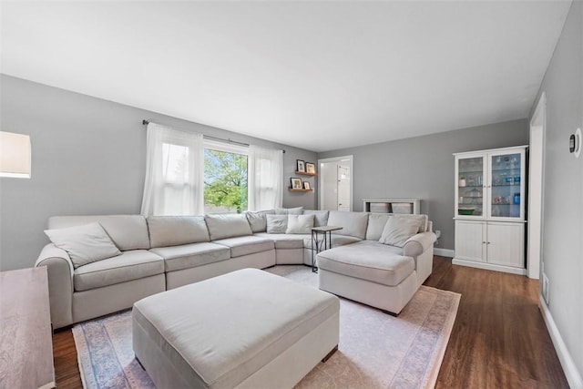 215 E Edgewood Dr, Peters Twp, PA 15317 - living area with dark wood-style floors and baseboards