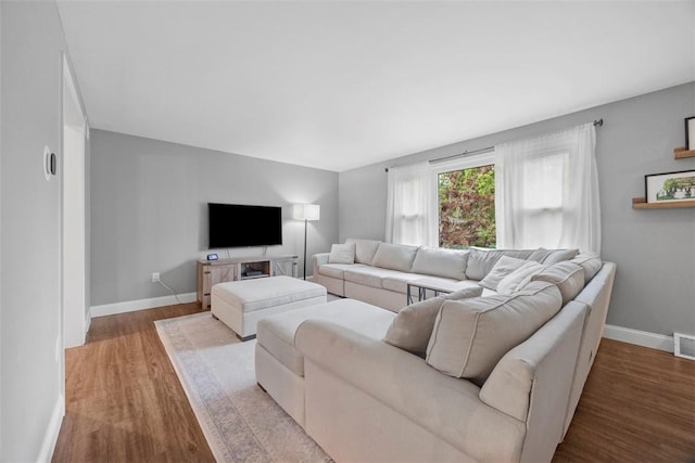 215 E Edgewood Dr, Peters Twp, PA 15317 - living area featuring wood finished floors and baseboards