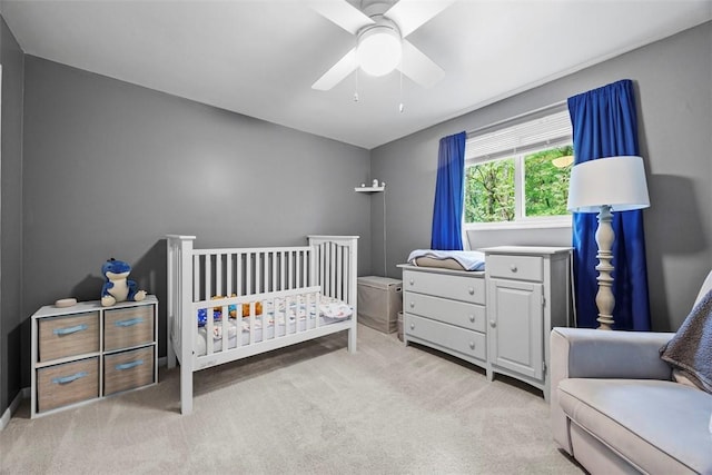 215 E Edgewood Dr, Peters Twp, PA 15317 - carpeted bedroom featuring a nursery area and ceiling fan
