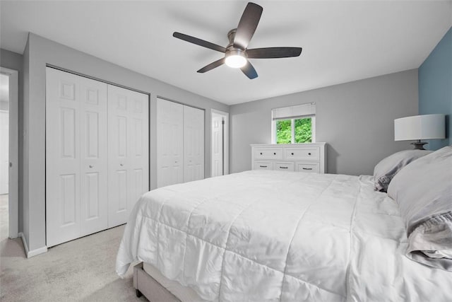 215 E Edgewood Dr, Peters Twp, PA 15317 - carpeted bedroom with two closets and ceiling fan