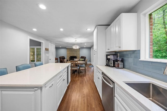 215 E Edgewood Dr, Peters Twp, PA 15317 - kitchen featuring recessed lighting, dishwasher, light countertops, a kitchen island, and dark wood-style flooring