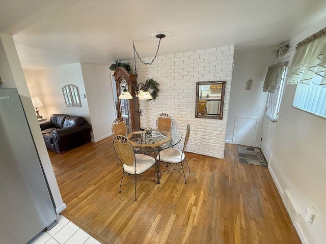 13901 Harvie Ct, North Huntingdon, PA 15642 - dining space with light wood-style floors and baseboards