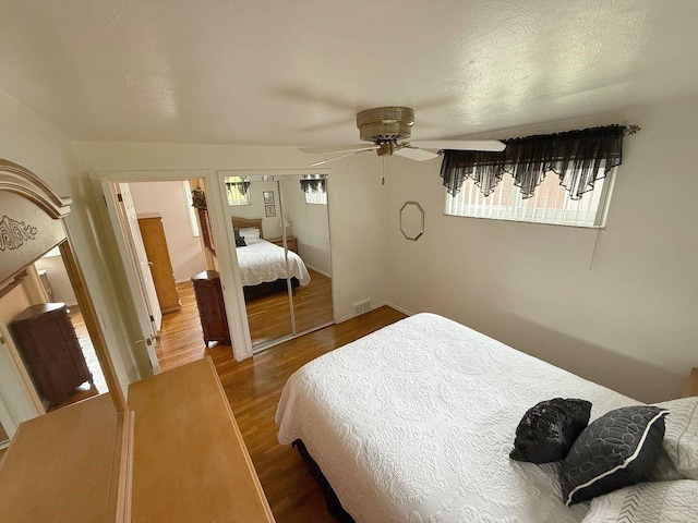 13901 Harvie Ct, North Huntingdon, PA 15642 - bedroom featuring wood finished floors, a closet, and ceiling fan