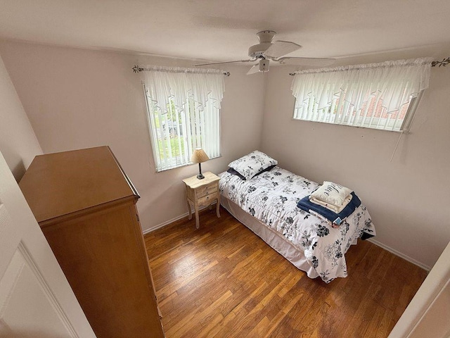 13901 Harvie Ct, North Huntingdon, PA 15642 - bedroom featuring multiple windows, wood finished floors, and ceiling fan