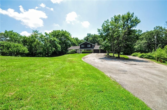306 Barbara Dr, Carroll Twp, PA 15063 - view of front of house featuring a front lawn and driveway