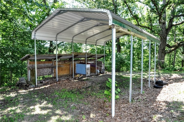 306 Barbara Dr, Carroll Twp, PA 15063 - view of vehicle parking with a carport