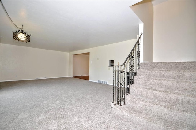 306 Barbara Dr, Carroll Twp, PA 15063 - stairs featuring carpet and baseboards