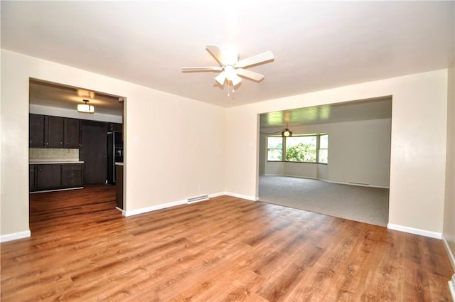 306 Barbara Dr, Carroll Twp, PA 15063 - unfurnished room with ceiling fan and light wood-style flooring
