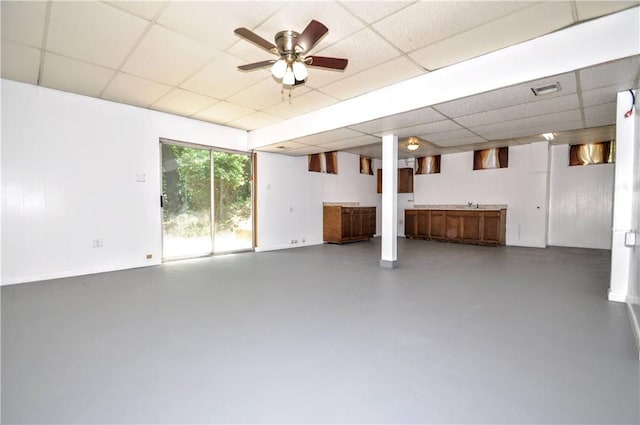 306 Barbara Dr, Carroll Twp, PA 15063 - below grade area with a drop ceiling and a ceiling fan