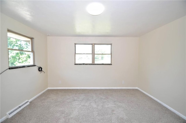 306 Barbara Dr, Carroll Twp, PA 15063 - carpeted empty room featuring baseboard heating and baseboards