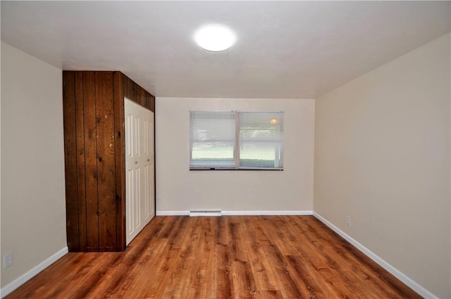 306 Barbara Dr, Carroll Twp, PA 15063 - unfurnished bedroom featuring wood finished floors and baseboards