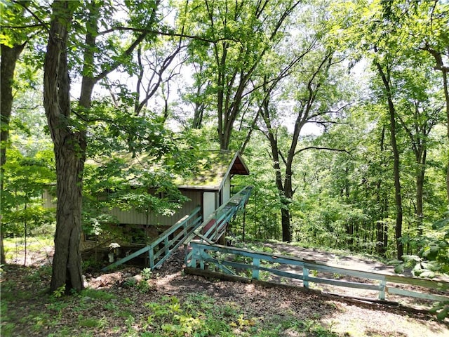 306 Barbara Dr, Carroll Twp, PA 15063 - view of yard with an outdoor structure and a view of trees