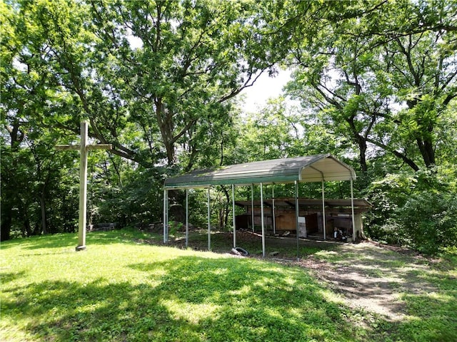 306 Barbara Dr, Carroll Twp, PA 15063 - view of green lawn with a carport