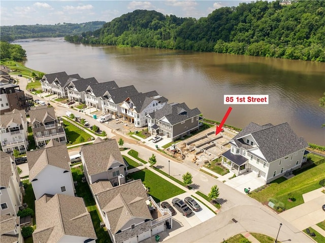 85 1st St, Oakmont, PA 15139 - aerial view of residential area featuring a large body of water and a forest